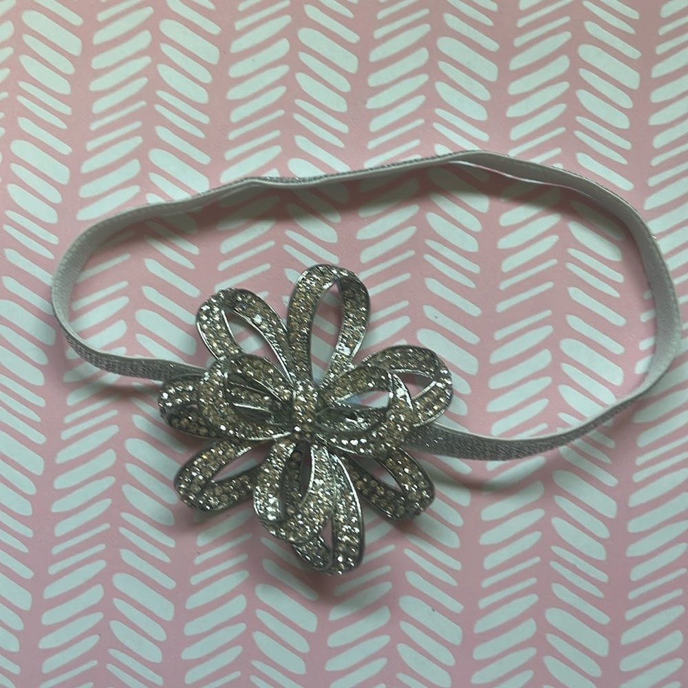 Limited edition holiday sparkly bow Tieks flower topper